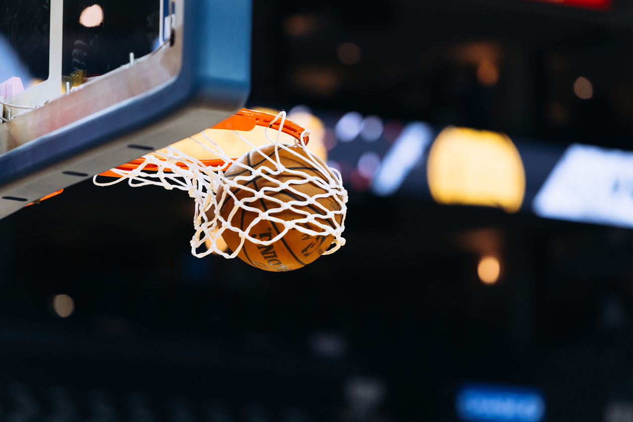 basketball goes through hoop