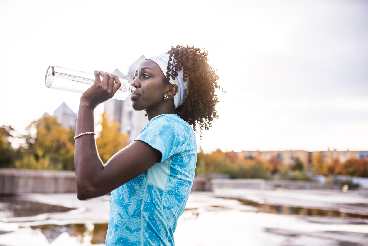 Athlete drinking water stock photo