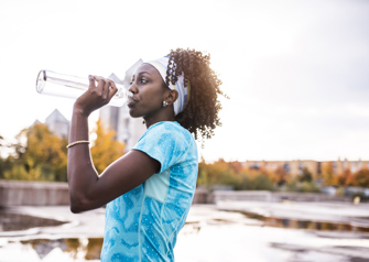 Athlete drinking water stock photo