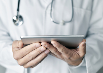 doctor using a tablet for a virtual patient visit