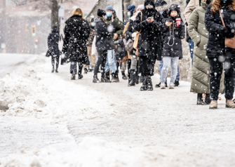 People waiting in line outside