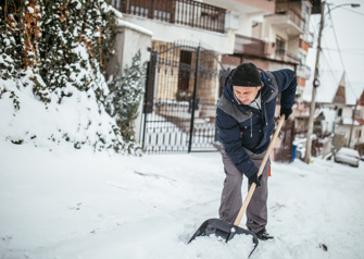 man shoveling snow