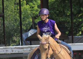 Patient Donna Marsh riding a horse