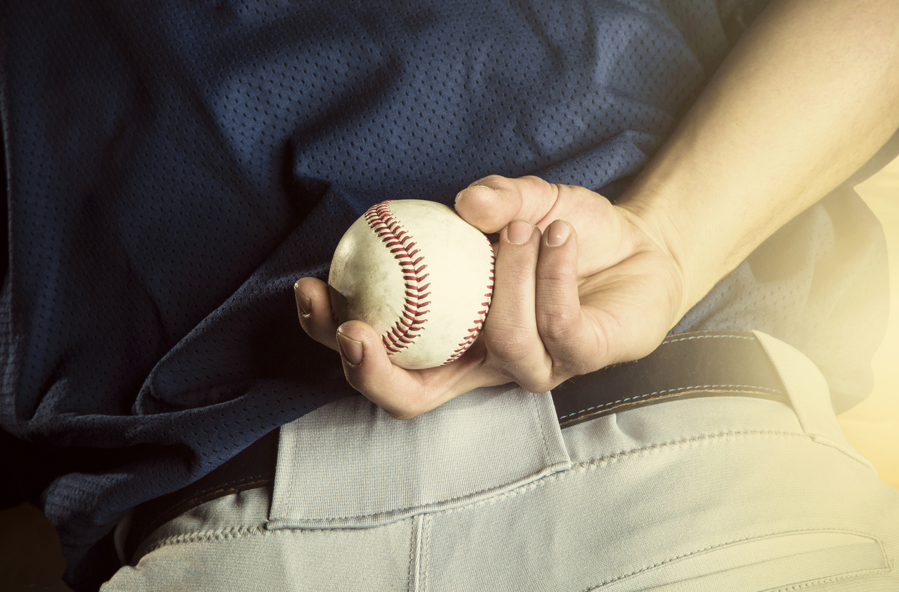 baseball player with baseball