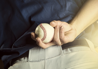 baseball player with baseball