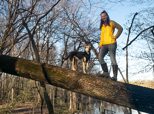 patient erin roark walking in park with dog