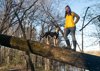 patient erin roark walking in park with dog