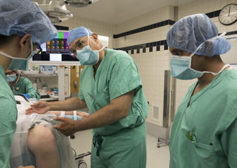 dr. bernard bach in operation room