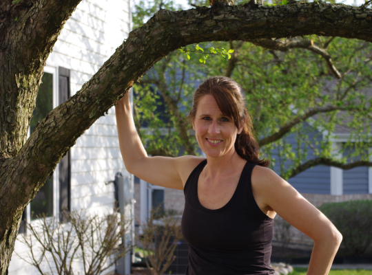 Patient Laura McElligott Standing in Yard