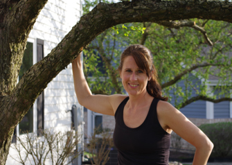 Patient Laura McElligott Standing in Yard